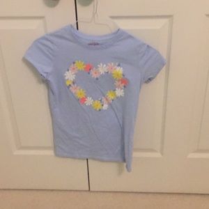 Girls blue shirt white heart